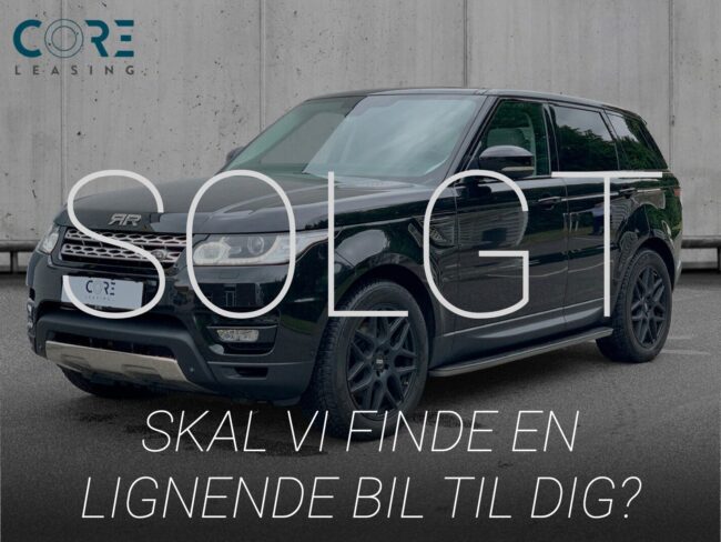 Sortmetal Land Rover Range Rover Sport TDV6 HSE aut. fra 2015 parkeret foran en betonmur. CORE Leasing A/S er eksperter i Land Rover leasing.