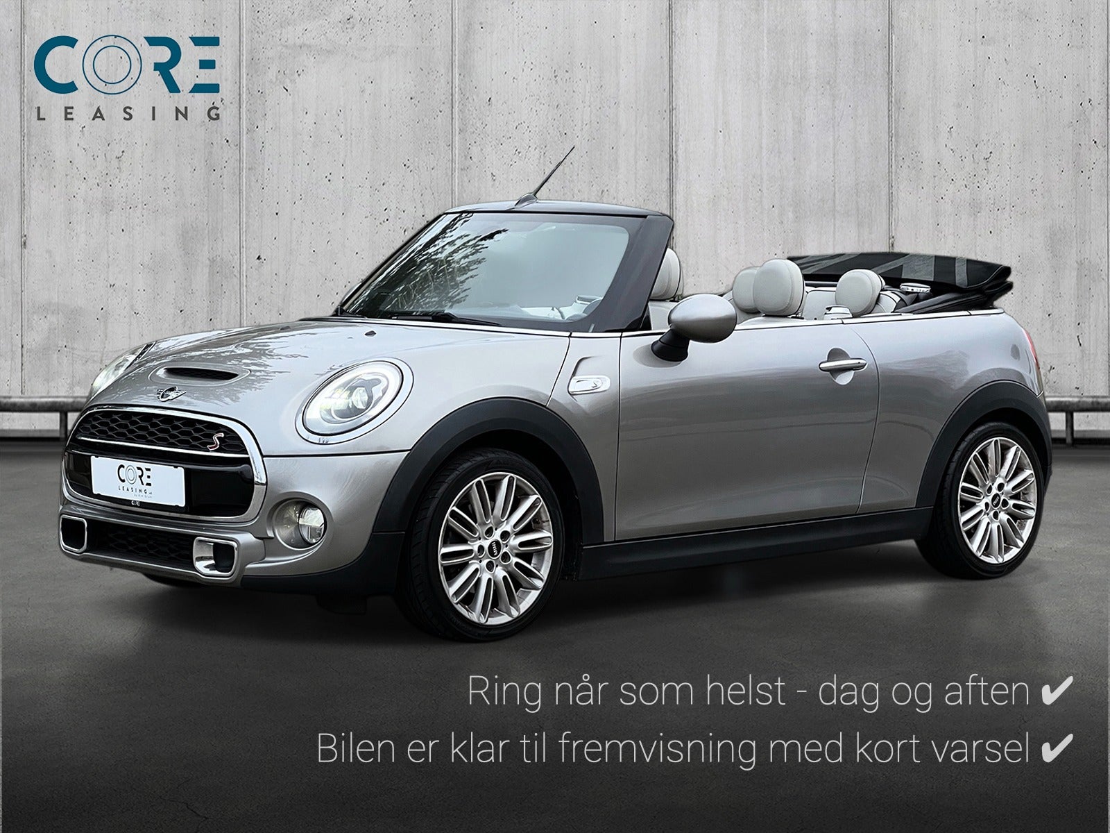 Sølvmetal MINI Cooper S Cabriolet aut. fra 2016 parkeret foran en betonmur. CORE Leasing A/S er eksperter i MINI leasing.