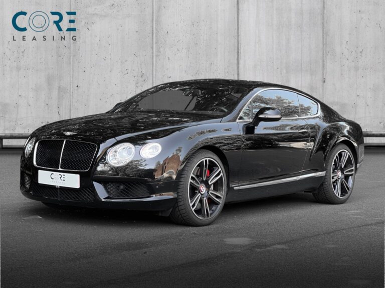 Sortmetal Bentley Continental GT V8 aut. fra 2012 parkeret foran en betonmur. CORE Leasing A/S er eksperter i Bentley leasing.