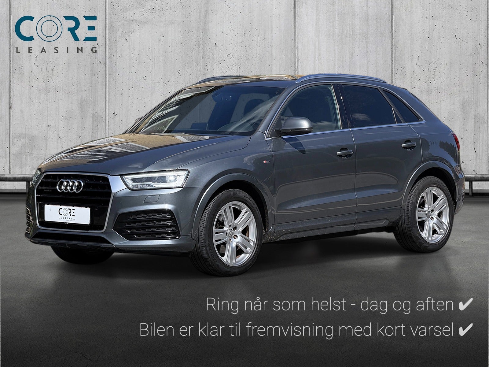 Gråmetal Audi Q3 TFSi 180 quattro S-tr. fra 2016 parkeret foran en betonmur. CORE Leasing A/S er eksperter i Audi leasing.