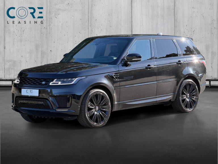 Sortmetal Land Rover Range Rover Sport SDV6 HSE aut. fra 2019 parkeret foran en betonmur. CORE Leasing A/S er eksperter i Land Rover leasing.