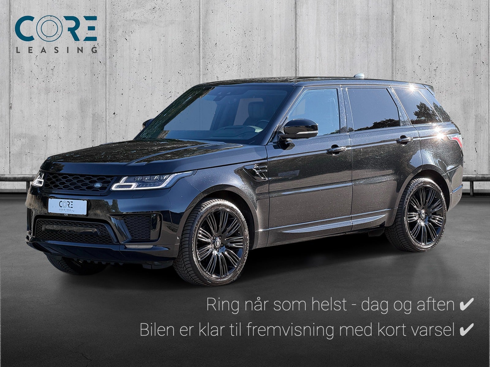 Sortmetal Land Rover Range Rover Sport SDV6 HSE aut. fra 2019 parkeret foran en betonmur. CORE Leasing A/S er eksperter i Land Rover leasing.
