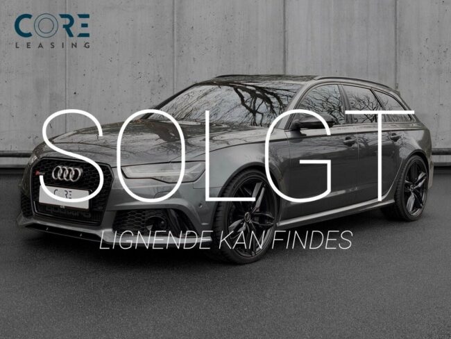 Gråmetal Audi RS6 TFSi performance Avant quattro Tiptr. fra 2016 parkeret foran en betonmur. CORE Leasing A/S er eksperter i Audi leasing.
