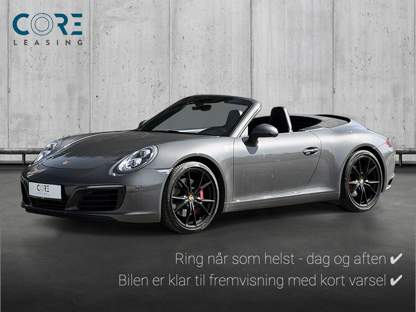 Gråmetal Porsche 911 Carrera S Cabriolet PDK fra 2016 parkeret foran en betonmur. CORE Leasing A/S er eksperter i Porsche leasing.