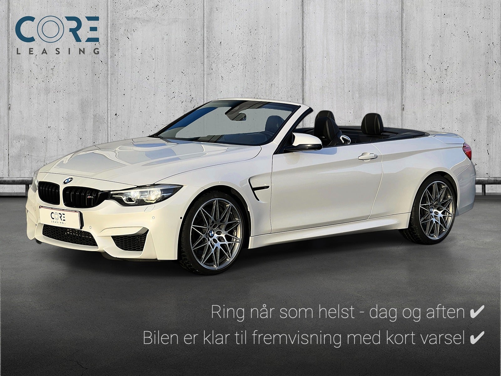 Hvidmetal BMW M4 Cabriolet Competition aut. fra 2018 parkeret foran en betonmur. CORE Leasing A/S er eksperter i BMW leasing.