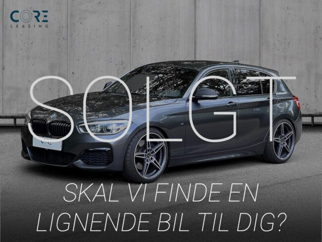 Gråmetal BMW M140i xDrive aut. fra 2017 parkeret foran en betonmur. CORE Leasing A/S er eksperter i BMW leasing.