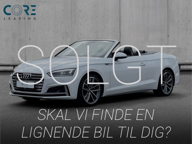 Hvidmetal Audi S5 TFSi Cabriolet quattro Tiptr. fra 2017 parkeret foran en betonmur. CORE Leasing A/S er eksperter i Audi leasing.