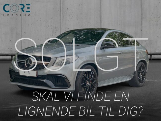 Sølvmetal Mercedes GLE63 AMG S Coupé aut. 4Matic fra 2016 parkeret foran en betonmur. CORE Leasing A/S er eksperter i Mercedes leasing.