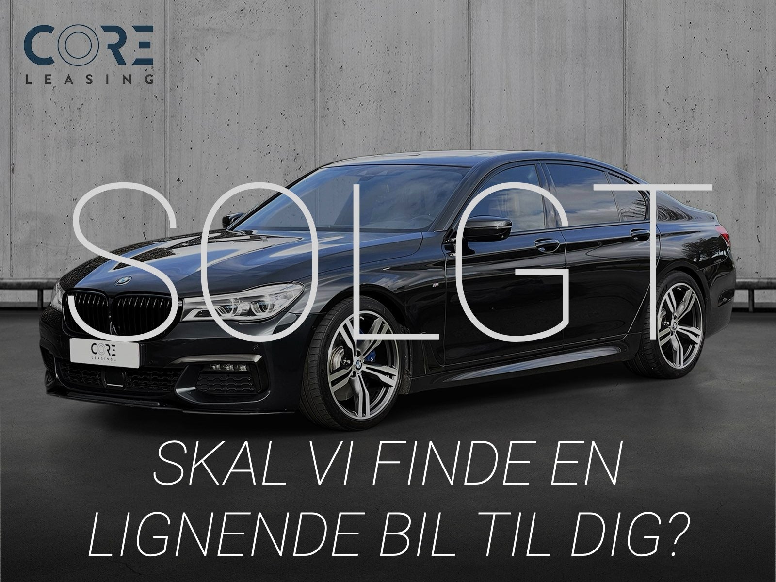 Sortmetal BMW 740i M-Sport aut. fra 2018 parkeret foran en betonmur. CORE Leasing A/S er eksperter i BMW leasing.