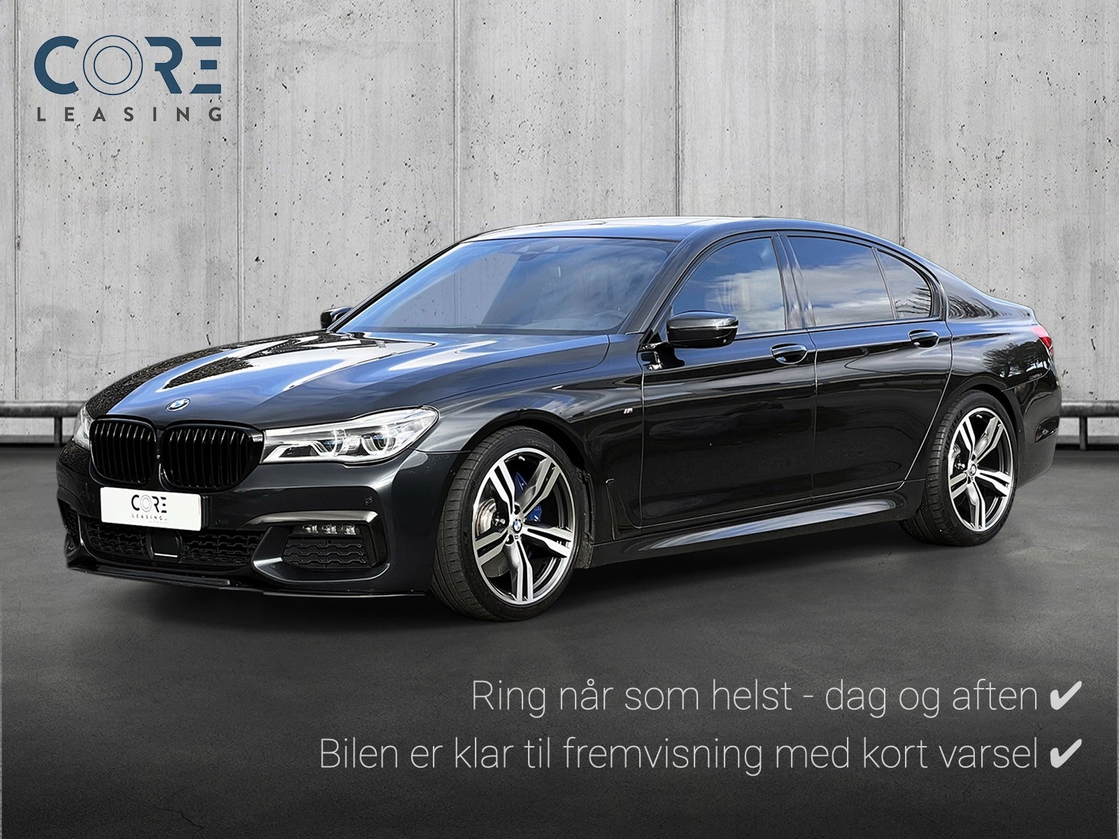 Sortmetal BMW 740i M-Sport aut. fra 2018 parkeret foran en betonmur. CORE Leasing A/S er eksperter i BMW leasing.