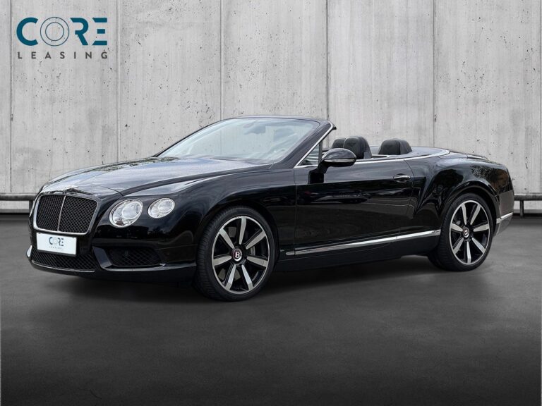 Sortmetal Bentley Continental GTC V8 aut. fra 2014 parkeret foran en betonmur. CORE Leasing A/S er eksperter i Bentley leasing.