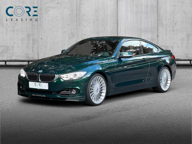 Grønmetal Alpina B4 Bi-turbo Coupé Sw-tr. AWD fra 2016 parkeret foran en betonmur. CORE Leasing A/S er eksperter i Alpina leasing.