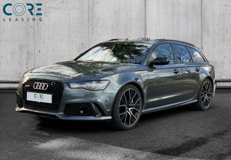 Gul Audi RS6 TFSi performance Avant quattro Tiptr. fra 2016 parkeret foran en betonmur. CORE Leasing A/S er eksperter i Audi leasing.