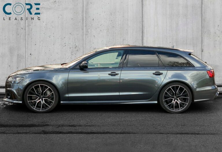 Gul Audi RS6 TFSi performance Avant quattro Tiptr. fra 2016 parkeret foran en betonmur. CORE Leasing A/S er eksperter i Audi leasing.