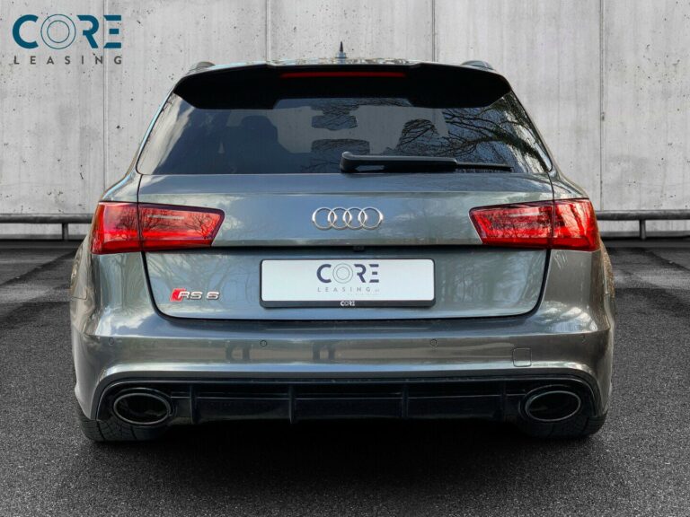 Gul Audi RS6 TFSi performance Avant quattro Tiptr. fra 2016 parkeret foran en betonmur. CORE Leasing A/S er eksperter i Audi leasing.