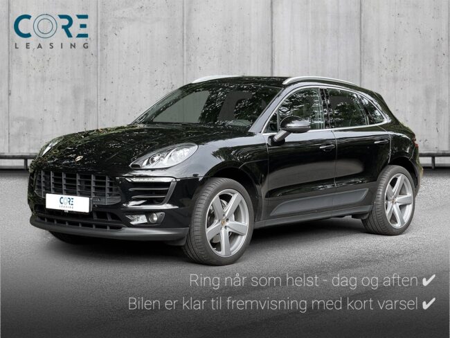 Sortmetal Porsche Macan S PDK fra 2017 parkeret foran en betonmur. CORE Leasing A/S er eksperter i Porsche leasing.