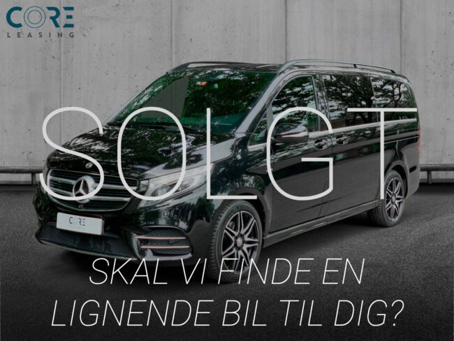 Sortmetal Mercedes V250 d Avantgarde aut. lang fra 2014 parkeret foran en betonmur. CORE Leasing A/S er eksperter i Mercedes leasing.