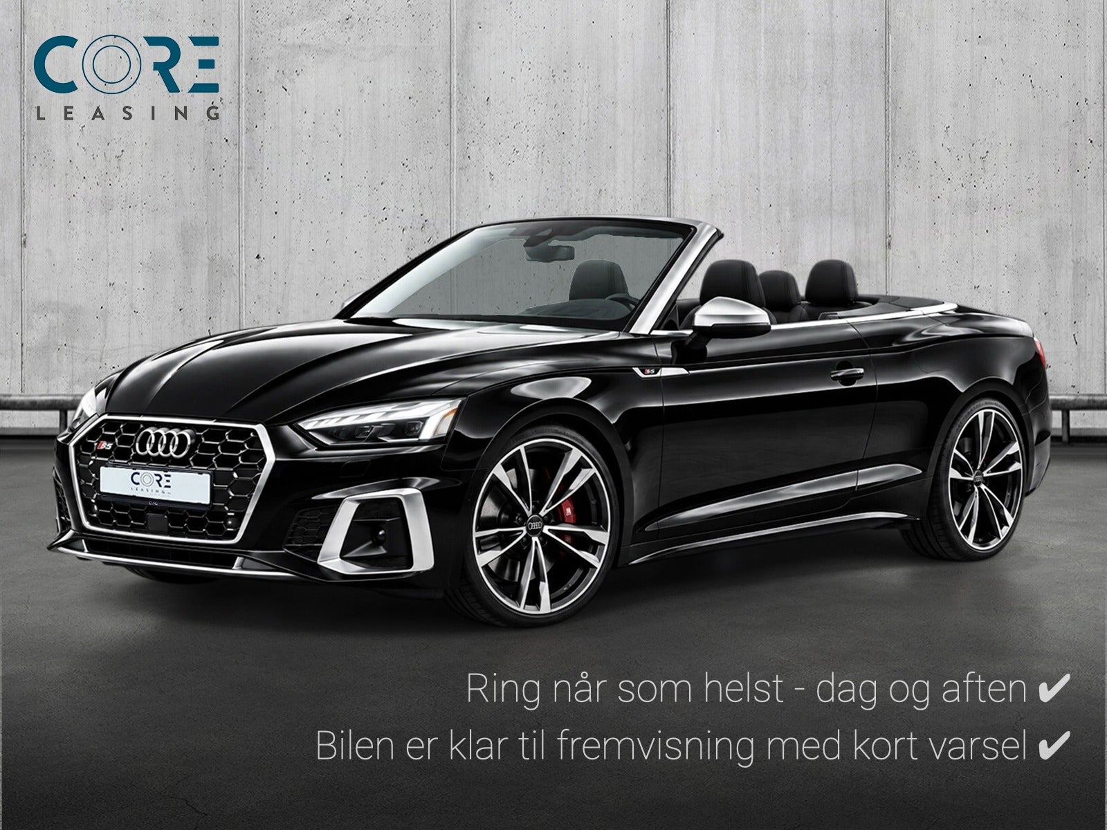 Sortmetal Audi S5 TFSi Cabriolet quattro Tiptr. fra 2022 parkeret foran en betonmur. CORE Leasing A/S er eksperter i Audi leasing.
