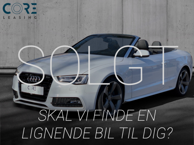 Hvidmetal Audi A5 TFSi Cabriolet quattro S-tr. fra 2015 parkeret foran en betonmur. CORE Leasing A/S er eksperter i Audi leasing.