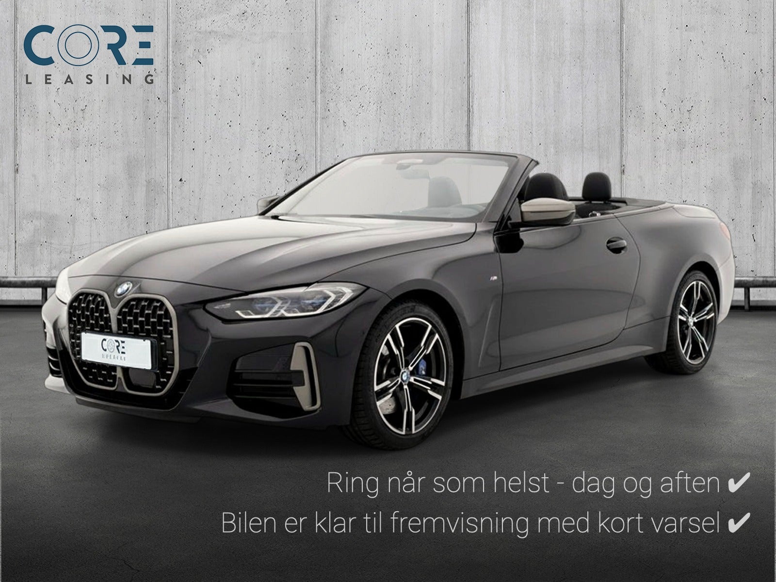 Sortmetal BMW M440i Cabriolet Connected xDrive aut. fra 2022 parkeret foran en betonmur. CORE Leasing A/S er eksperter i BMW leasing.