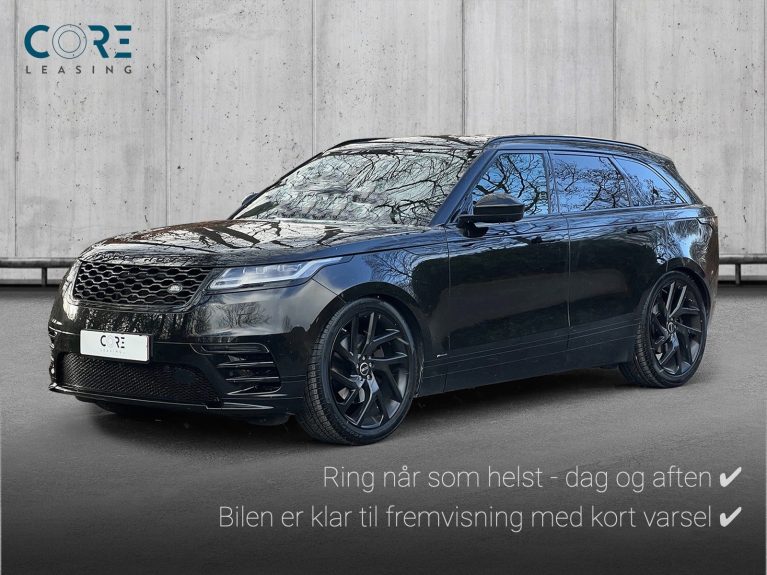 Sortmetal Land Rover Range Rover Velar D300 R-Dynamic HSE aut. fra 2018 parkeret foran en betonmur. CORE Leasing A/S er eksperter i Land Rover leasing.