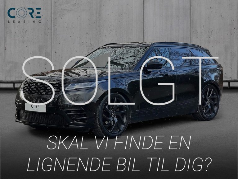 Sortmetal Land Rover Range Rover Velar D300 R-Dynamic HSE aut. fra 2018 parkeret foran en betonmur. CORE Leasing A/S er eksperter i Land Rover leasing.