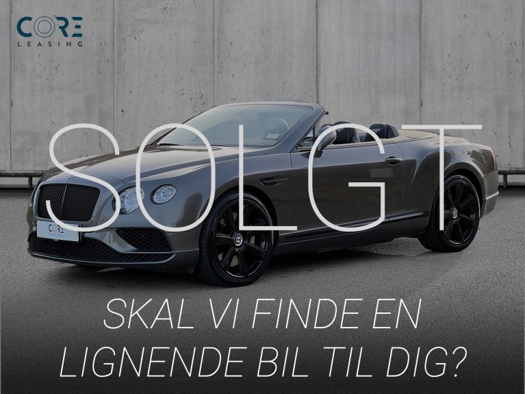 Gråmetal Bentley Continental GTC V8 aut. fra 2015 parkeret foran en betonmur. CORE Leasing A/S er eksperter i Bentley leasing.