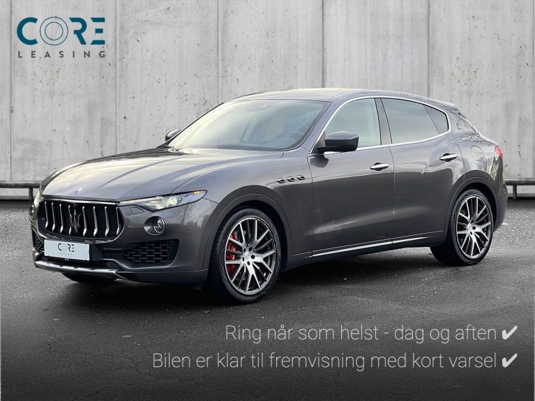 Gråmetal Maserati Levante S aut. fra 2017 parkeret foran en betonmur. CORE Leasing A/S er eksperter i Maserati leasing.