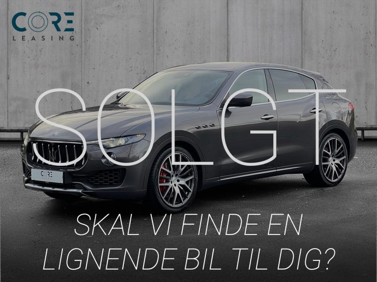 Gråmetal Maserati Levante S aut. fra 2017 parkeret foran en betonmur. CORE Leasing A/S er eksperter i Maserati leasing.