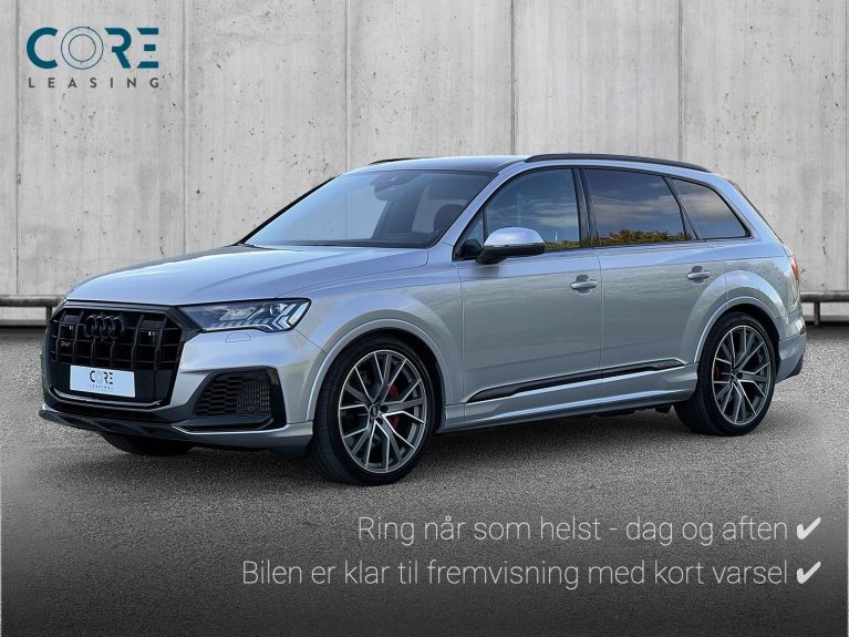 Sølvmetal Audi SQ7 TDi quattro Tiptr. 7prs fra 2020 parkeret foran en betonmur. CORE Leasing A/S er eksperter i Audi leasing.
