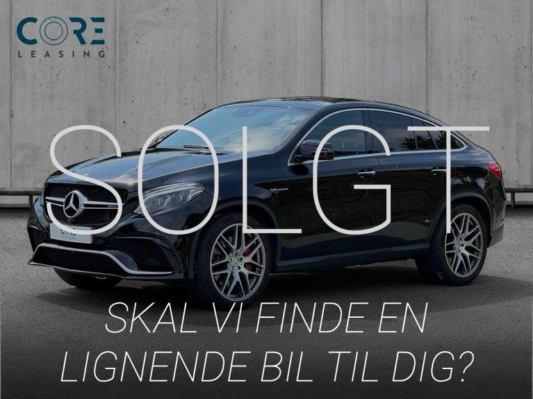 Sortmetal Mercedes GLE63 AMG S Coupé aut. 4Matic fra 2019 parkeret foran en betonmur. CORE Leasing A/S er eksperter i Mercedes leasing.