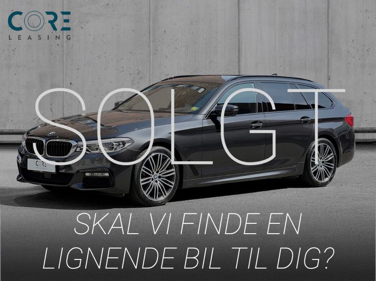 Gråmetal BMW 530d Touring xDrive aut. fra 2017 parkeret foran en betonmur. CORE Leasing A/S er eksperter i BMW leasing.