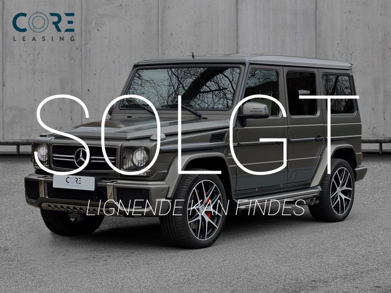 Gråmetal Mercedes G63 AMG aut. fra 2017 parkeret foran en betonmur. CORE Leasing A/S er eksperter i Mercedes leasing.