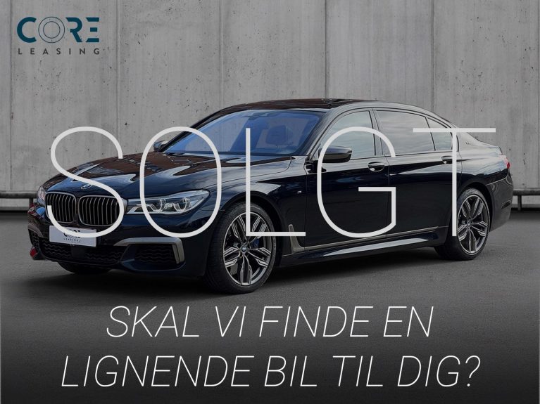 Sortmetal BMW M760Li xDrive aut. fra 2017 parkeret foran en betonmur. CORE Leasing A/S er eksperter i BMW leasing.