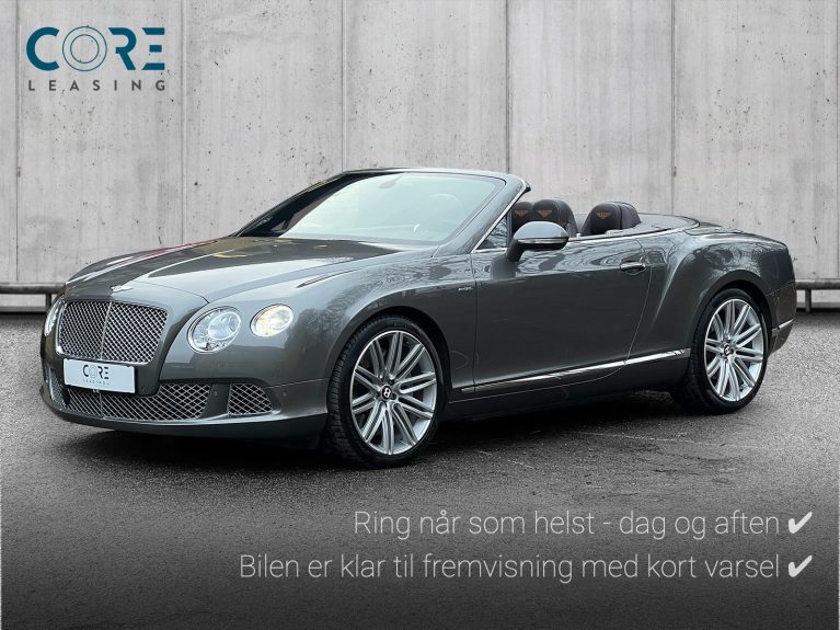 Gråmetal Bentley Continental GTC W12 Speed aut. fra 2013 parkeret foran en betonmur. CORE Leasing A/S er eksperter i Bentley leasing.