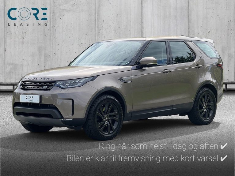 Brunmetal Land Rover Discovery 5 TD6 SE aut. fra 2017 parkeret foran en betonmur. CORE Leasing A/S er eksperter i Land Rover leasing.