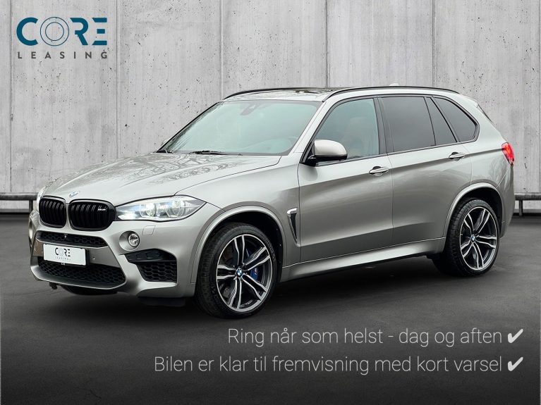 Sølvmetal BMW X5 M xDrive aut. fra 2015 parkeret foran en betonmur. CORE Leasing A/S er eksperter i BMW leasing.