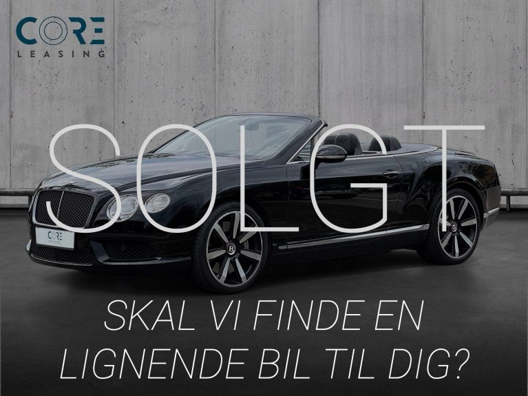 Sortmetal Bentley Continental GTC V8 aut. fra 2014 parkeret foran en betonmur. CORE Leasing A/S er eksperter i Bentley leasing.