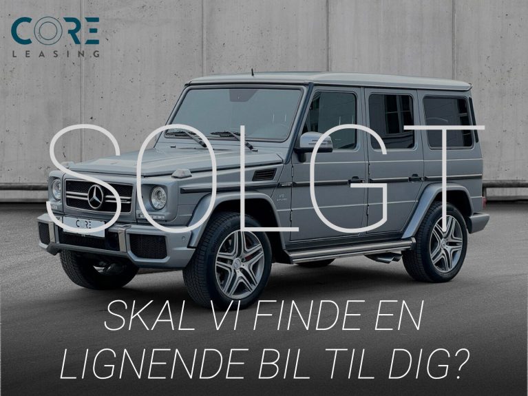 Gråmetal Mercedes G63 AMG aut. fra 2018 parkeret foran en betonmur. CORE Leasing A/S er eksperter i Mercedes leasing.