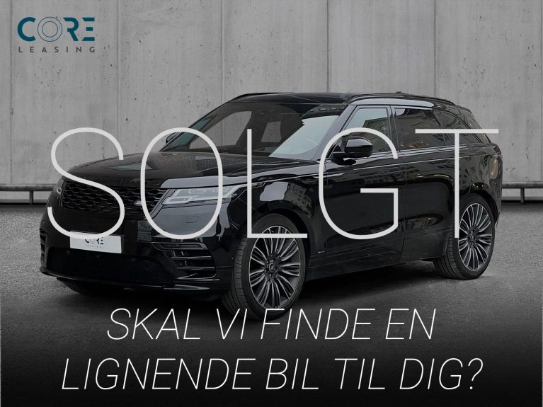 Sortmetal Land Rover Range Rover Velar P380 R-Dynamic HSE aut. fra 2018 parkeret foran en betonmur. CORE Leasing A/S er eksperter i Land Rover leasing.