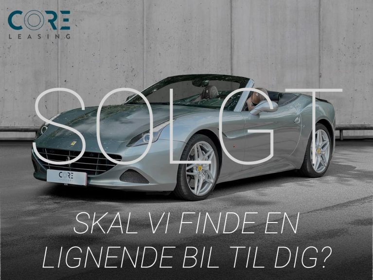 Sølvmetal Ferrari California T Handling Speciale F1 fra 2016 parkeret foran en betonmur. CORE Leasing A/S er eksperter i Ferrari leasing.