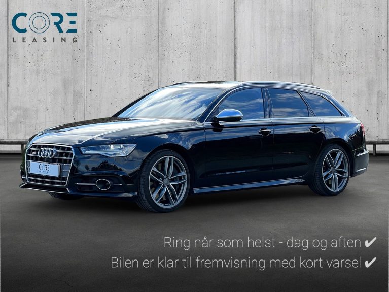 Sortmetal Audi S6 TFSi Avant quattro S-tr. fra 2015 parkeret foran en betonmur. CORE Leasing A/S er eksperter i Audi leasing.