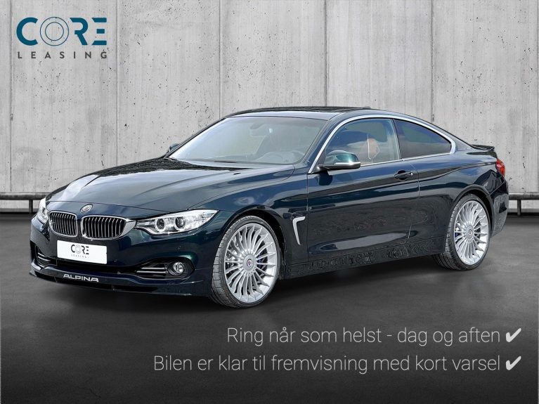 Grønmetal Alpina B4 Bi-turbo Coupé Sw-tr. fra 2016 parkeret foran en betonmur. CORE Leasing A/S er eksperter i Alpina leasing.